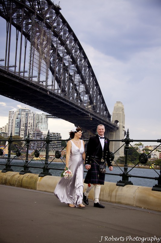 Bride and groom with Sydney Harbour Bridge - wedding photography sydney